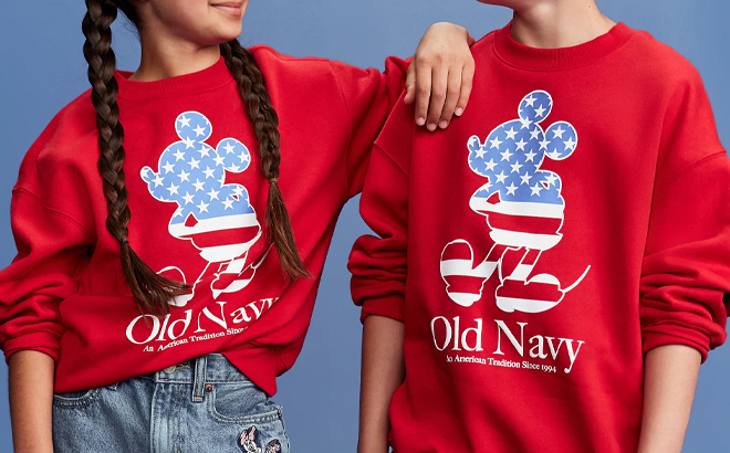 A Girl and a Boy Wearing Old Navy x Disney Mickey Mouse Flag Logo Graphic Crew Neck Sweatshirt