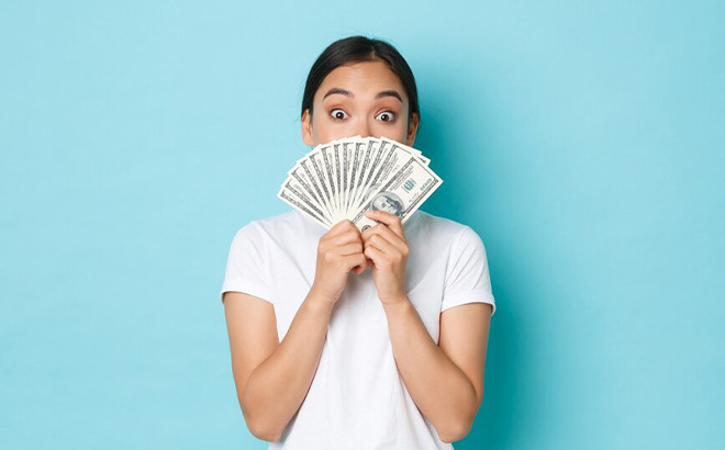 A Girl Holding Money
