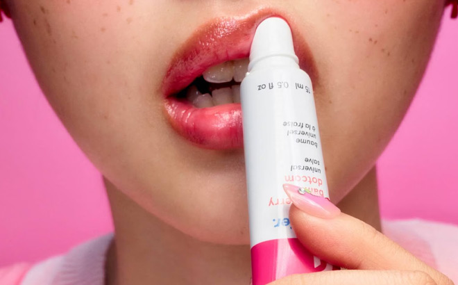 A Girl Putting Lip Balm on