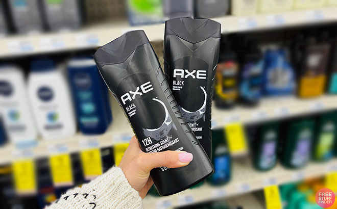 A handing holding two Axe Mens Body Wash