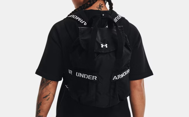 A Person Carrying the Under Armour UA Favorites Backpack