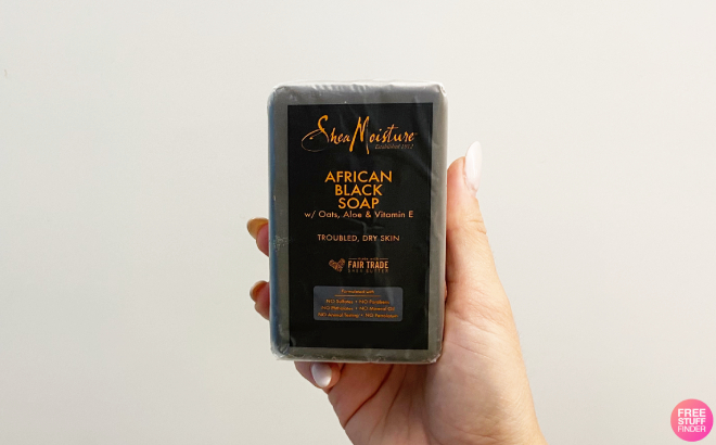 A Person Holding a SheaMoisture African Black Soap