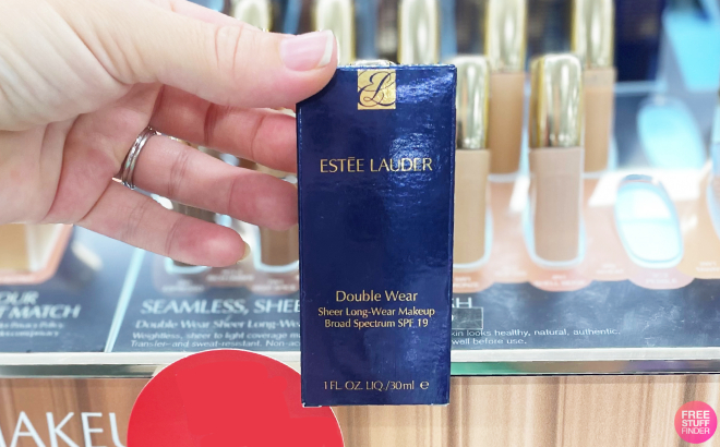 A Person Holding an Estee Lauder Double Wear Sheer Long Wear Foundation