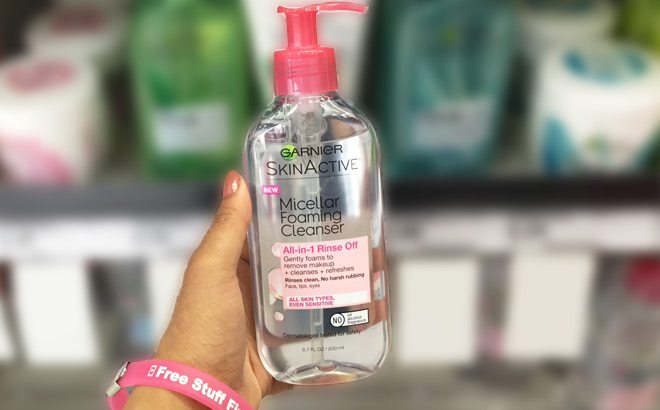 A Person Holding Garnier SkinActive Micellar Foaming Face Wash