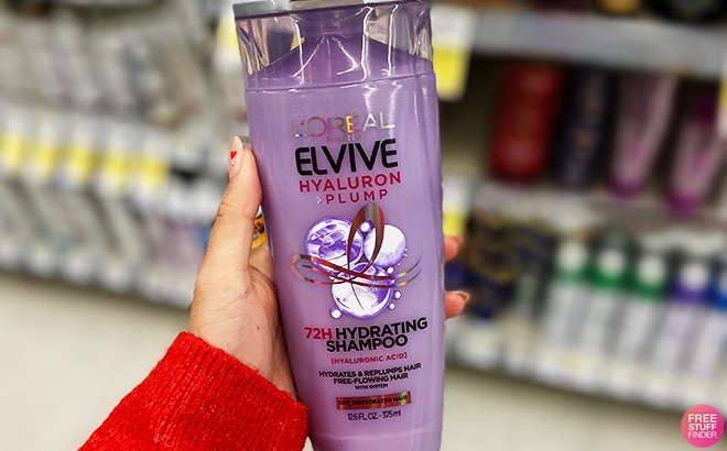 A Person Holding LOreal Paris Elvive Hyaluron Plump Hydrating Shampoo