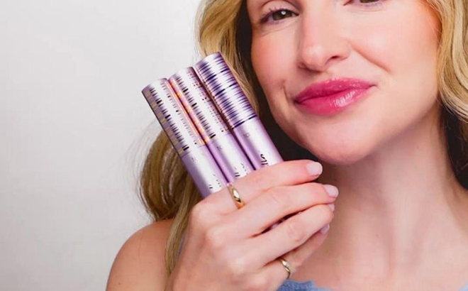 A Person Holding The Tarte Tartelette Lash Extension Tubing Mascara Trio