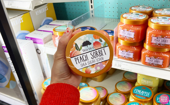 A Person Holding Tree Hut Peach Sorbet Shea Sugar Body Scrub