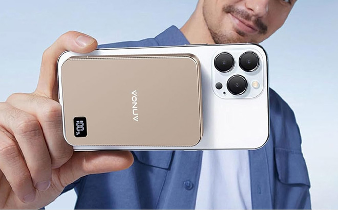 A Person Holding Voniv Magnetic Portable Power Bank