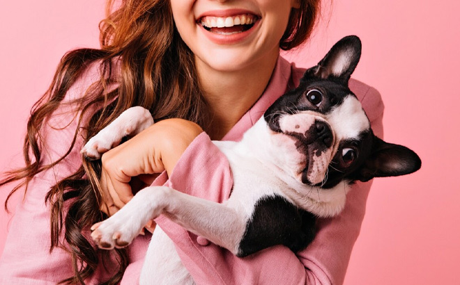 A Person Hugging Dog