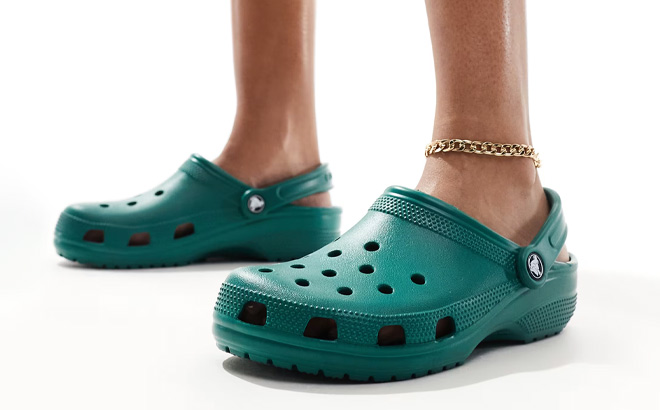 A Person Wearing Crocs Classic Clogs