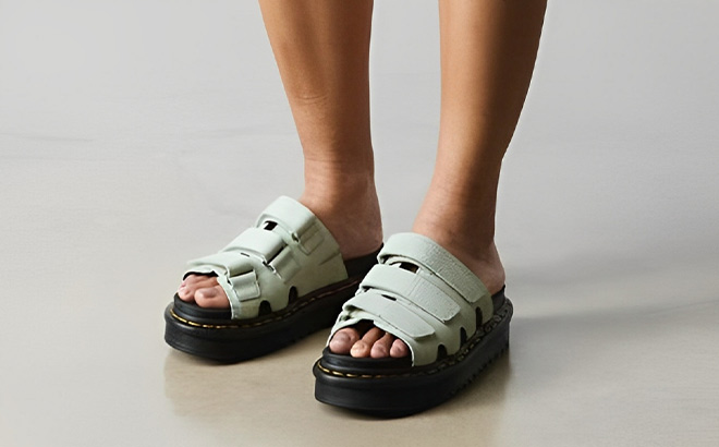 A Person Wearing Dr Martens Athena Leather Sandals