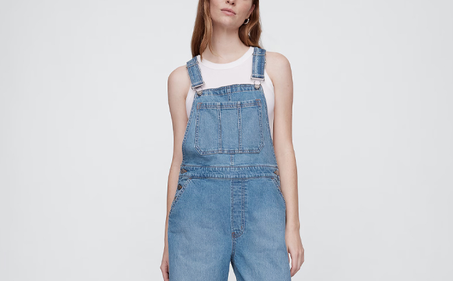A Person wearing GAP Factory Denim Overalls