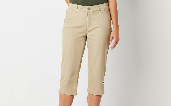 A Person wearing St Johns Bay Secretly Slender Womens Mid Rise Capri Pants