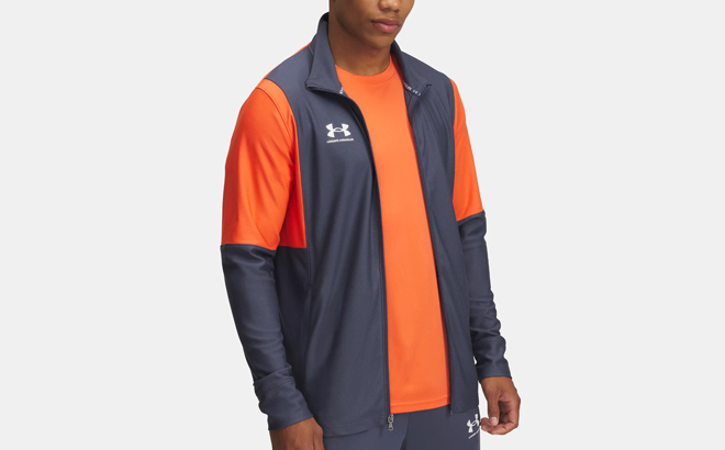 A Person wearing Under Armour Challenger Mens Track Jacket