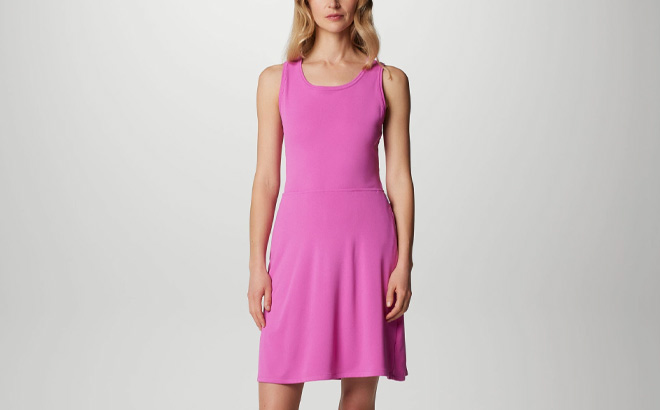 A Person Wearing Womens PFG Tidal Dress in Bright Lavender Color
