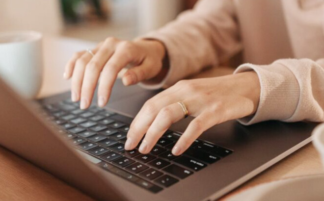 A Person Working on a Laptop