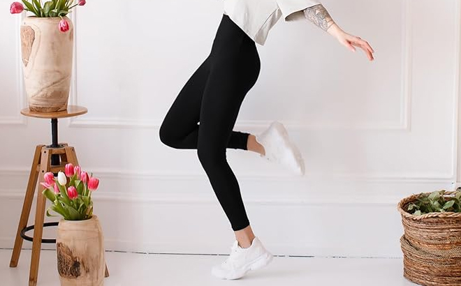 A Woman Wearing Stanpetix High Waisted Leggings