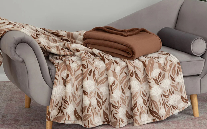 Berkshire PrimaLush Throw Blankets in Brown Color on a Sofa