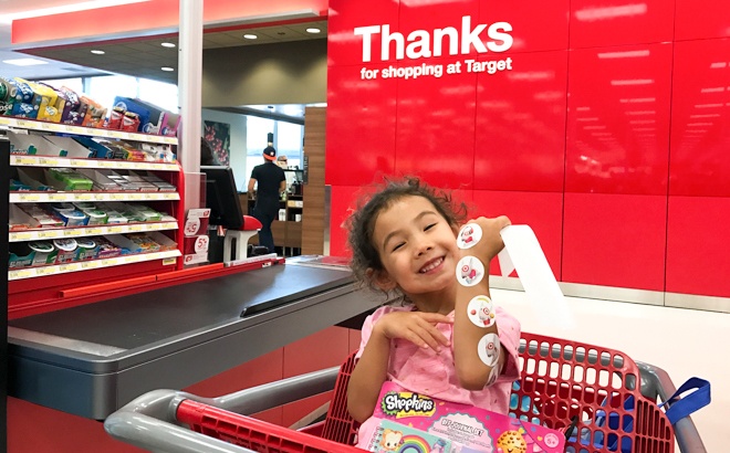 A Girl in a Target Shopping Cart 