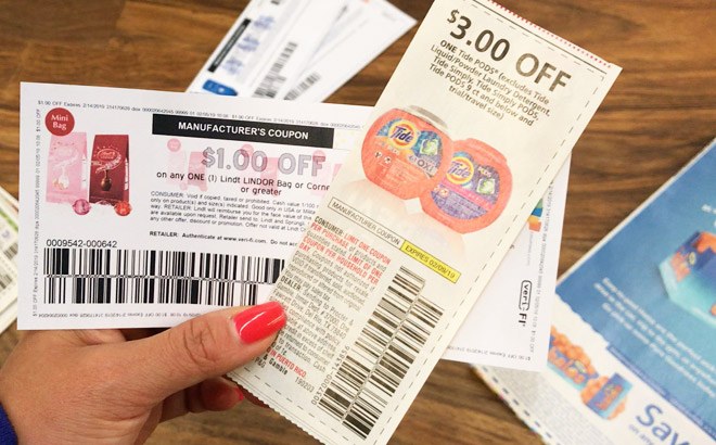 A Hand Holding Coupons