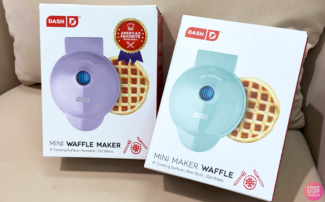 Dash Nonstick Mini Waffle Makers in Lilac and Aqua Colors on a Sofa