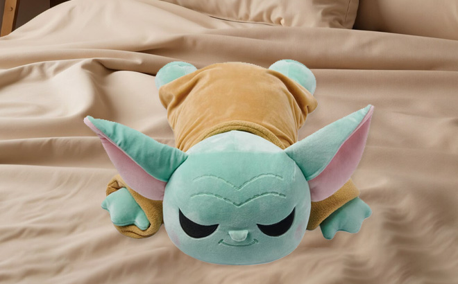 Disney Star Wars Grogu Kids Cuddleez Stuffed Animal Plush on the Bed