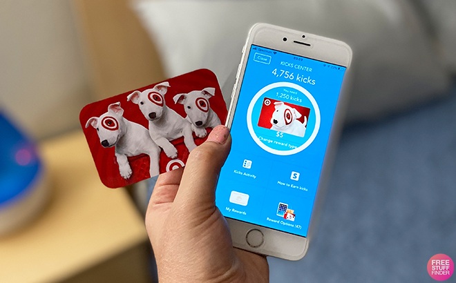 Hand Holding a Target Gift Card on the left, and a Phone on the Right