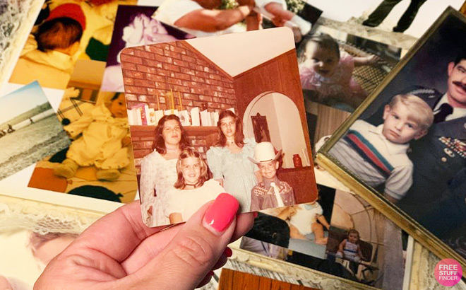 Hand Holding an Old Family Photo