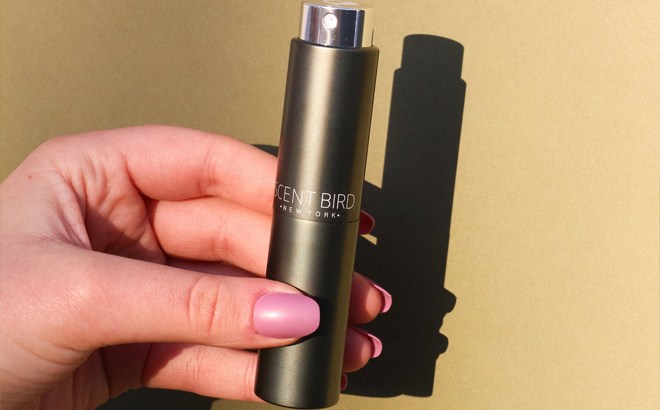 Hand Holding Scentbird Luxury Perfume Sample