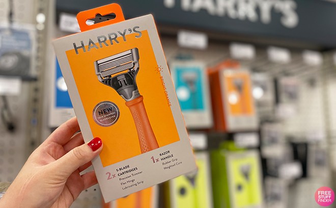 A Hand Holding Harry's 5-Blade razor Kit