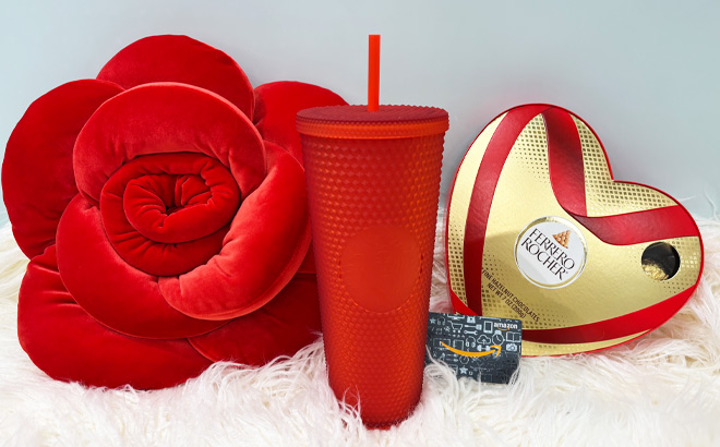 Heart Pillow Starbucks Tumbler Gift Card and Ferrero Rocher Box on a Blanket