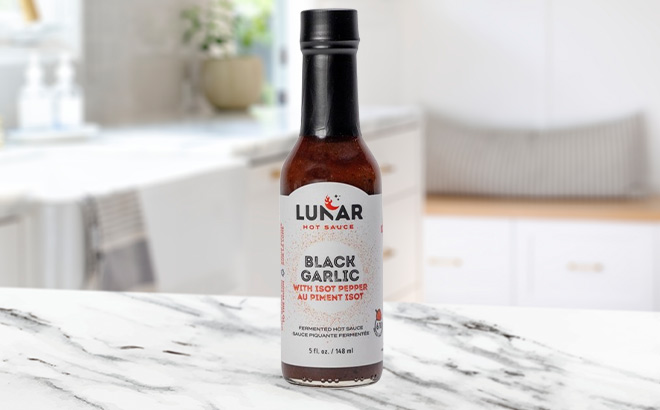 Lunar Black Garlic Fermented Hot Sauce on the Table