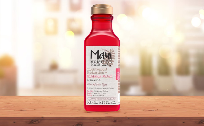 Maui Moisture Lightweight Hydration Hibiscus Water Shampoo on the Table