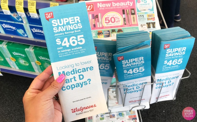 A Hand Holding a Walgreens Pamphlet