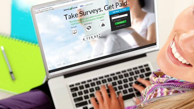 A Person Signing Up for Survey Junkie on a Laptop