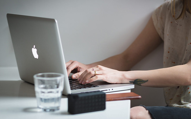 Woman Working on a Mac Laptop